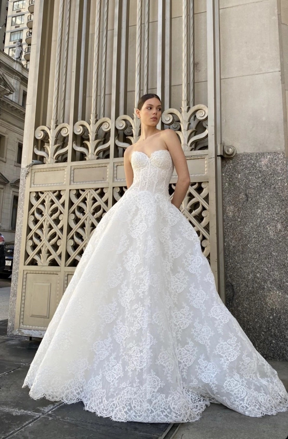 Model wearing a white Dropwaist style gown