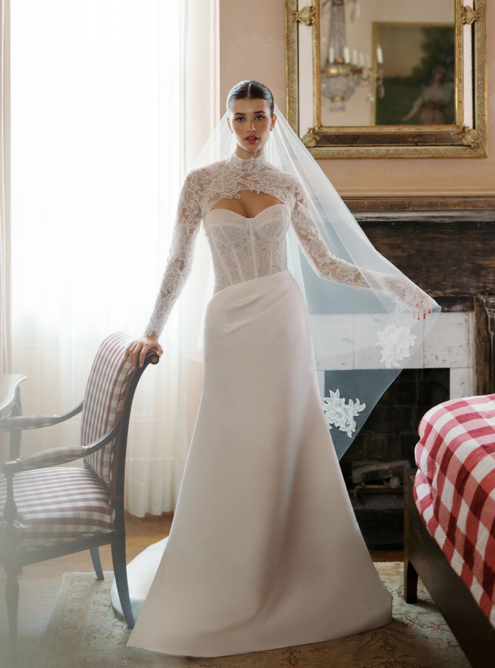 Model wearing a white Anne Barge gown
